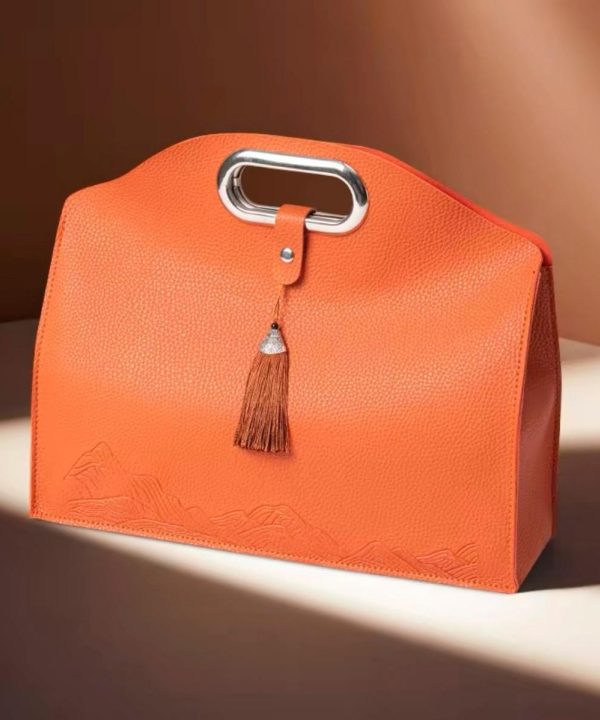 Orange tassel bag