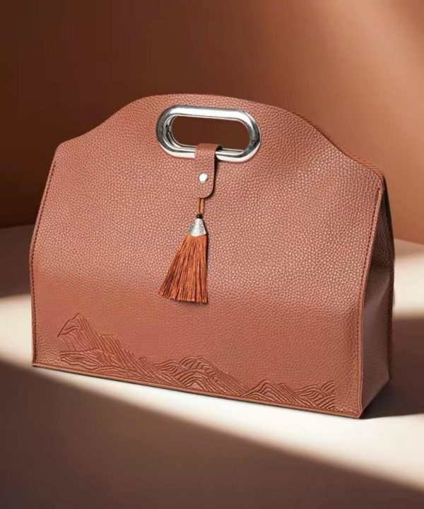 Copper tassel bag